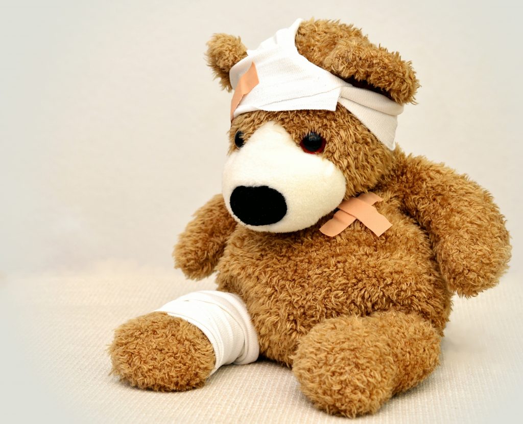 Brown and white bear plush toy